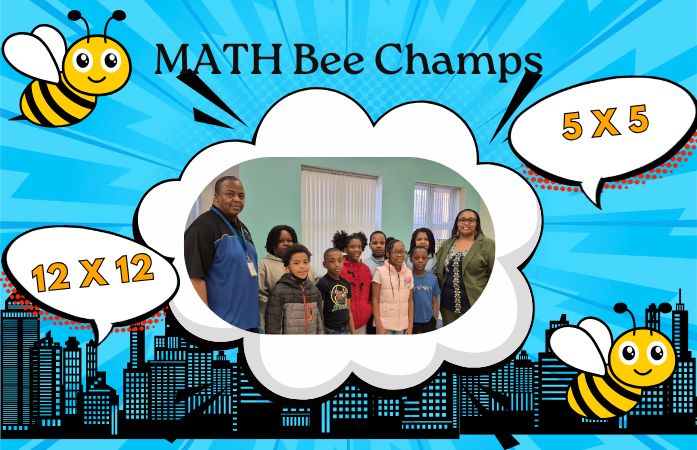 Staff and students celebrating their victory for the Math Bee.